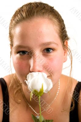 young woman holds a rose