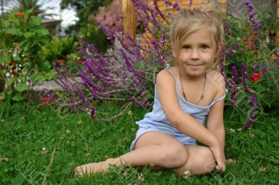 cute little girl on the grass