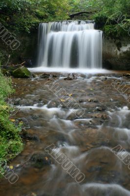 Waterfall in the forest on cloudy day