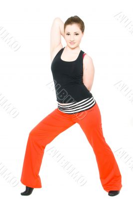 A young girl stretching