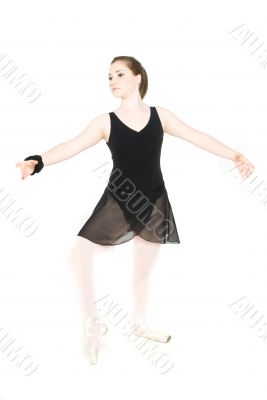 A young girl stretching