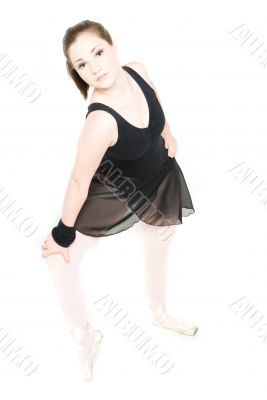 A young girl stretching