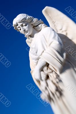 angel against blue sky