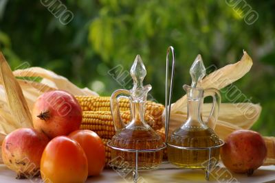 Olive Oil And Vinegar And Fruits
