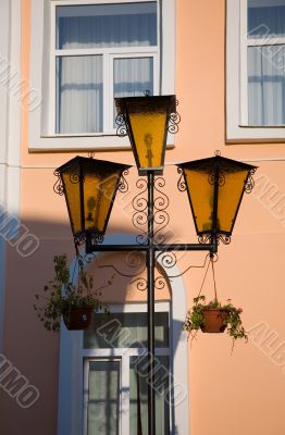 Golden lanterns with flowers