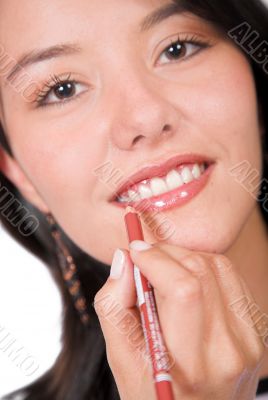 Beautiful Girl applying make up 1