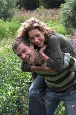 Piggyback ride in the garden