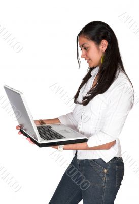 casual girl browsing on a laptop casual girl browsing on a laptop