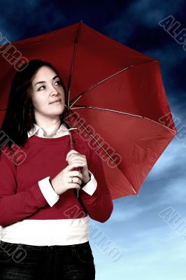 girl with umbrella in a bad weather day