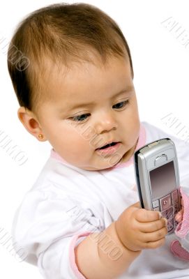 baby girl with a mobile phone
