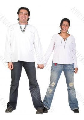 casual couple in white holding hands