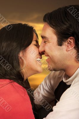 beautiful couple enjoying the sunset