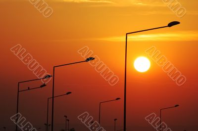 Lampposts at sunset