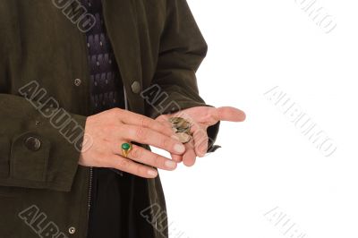 serious man counting coins