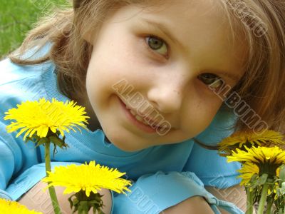 child with dandelions