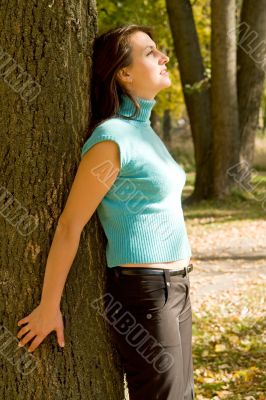 woman near a tree woman near a tree