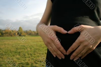 Heart From Hands, pregnant woman
