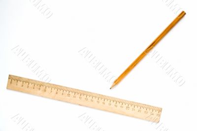 Wooden ruler and pencil