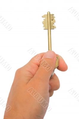 hand holding a key