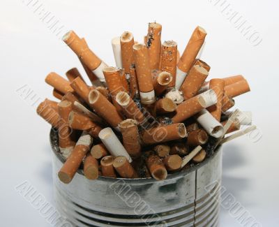 Pile of cigarette butts in ashtray
