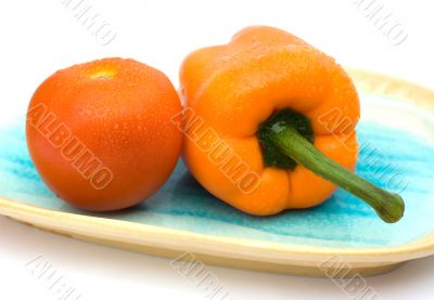 Tomato and capsicum on a plate