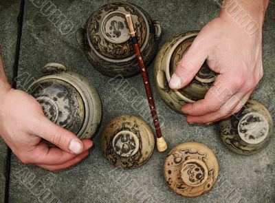 pitchers, hands and old-time flute