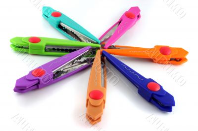 Brightly colors craft scissors on a white background