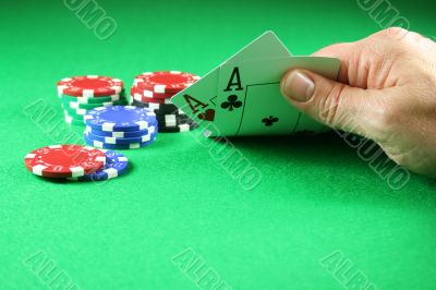 Poker - A Pair of Aces with Poker Chips