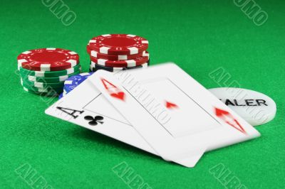 Poker - A Pair of Aces with Poker Chips