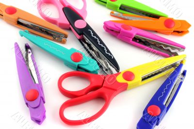 Brightly colors craft scissors on a white background