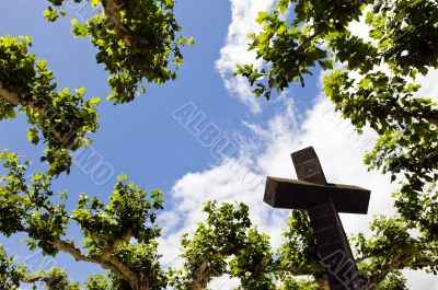 Cross above the trees
