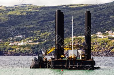 Dredger and barge