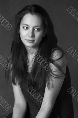 Black-and-white portrait of the beautiful brunette