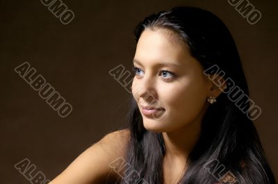 The beautiful brunette with long hair