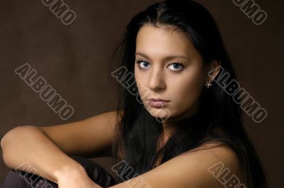 The beautiful brunette with long hair