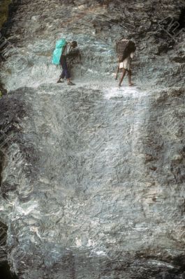 Porters on steep trail