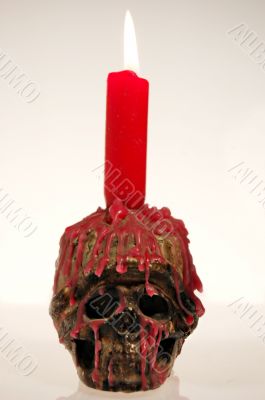 Skull with candle
