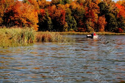 couple fishing with fall colors