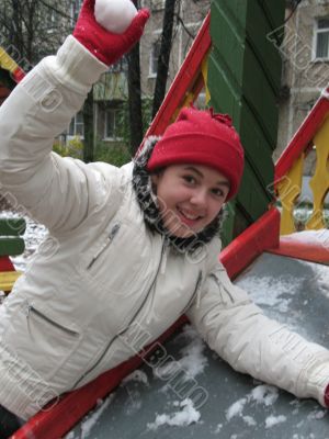 Playing girl with snowball