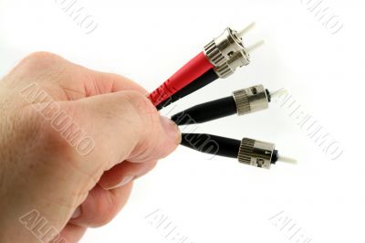 Fiber Optic Computer Cable held in the Hand