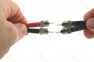 Fiber Optic Computer Cables held in the Hand