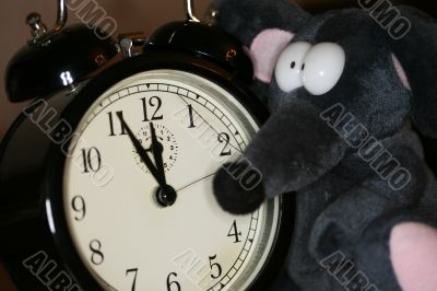 toy mouse and clock in eve of new year