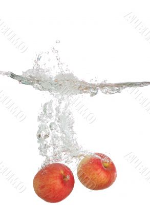 Two Apples splash into water
