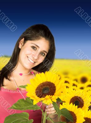 beautiful girl in sunflower field