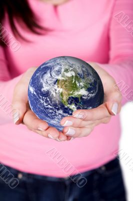 hands holding globe