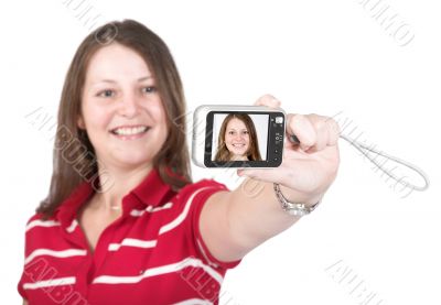 girl having fun with digital camera