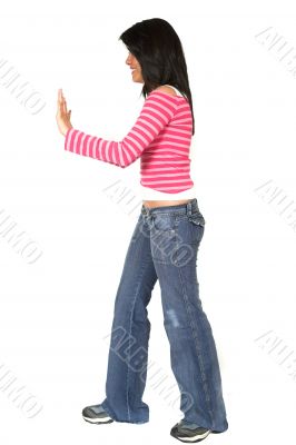 casual girl pushing something aside