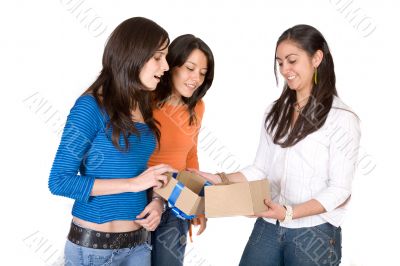 girls opening a gift