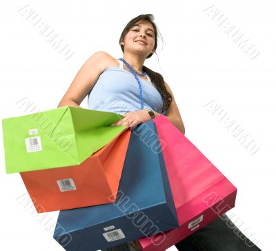 beautiful teenager with shopping bags