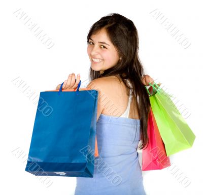 beautiful teenager with shopping bags